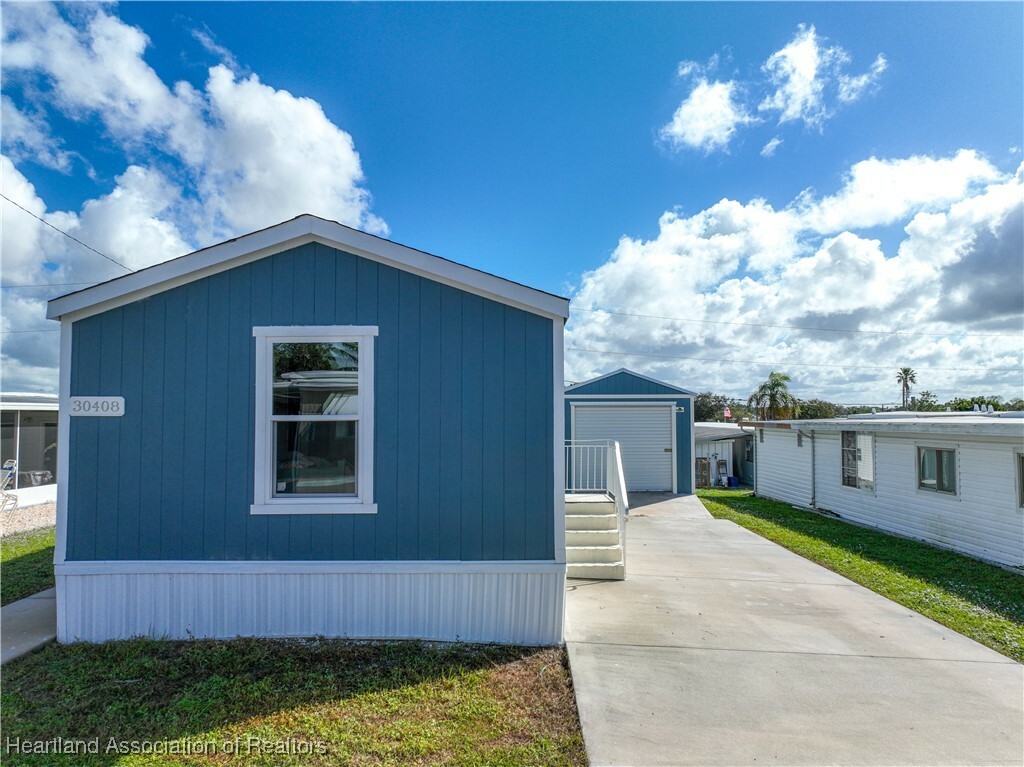 Property Photo:  30408 Tiger Tail Road  FL 33870 