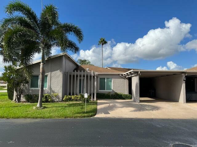Property Photo: 14747 Wildflower Lane FL 33446
