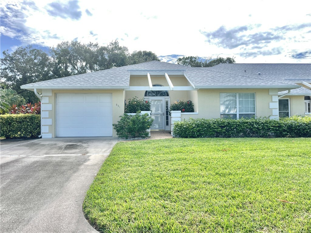 Property Photo:  831 Lake Orchid Circle 831  FL 32962 