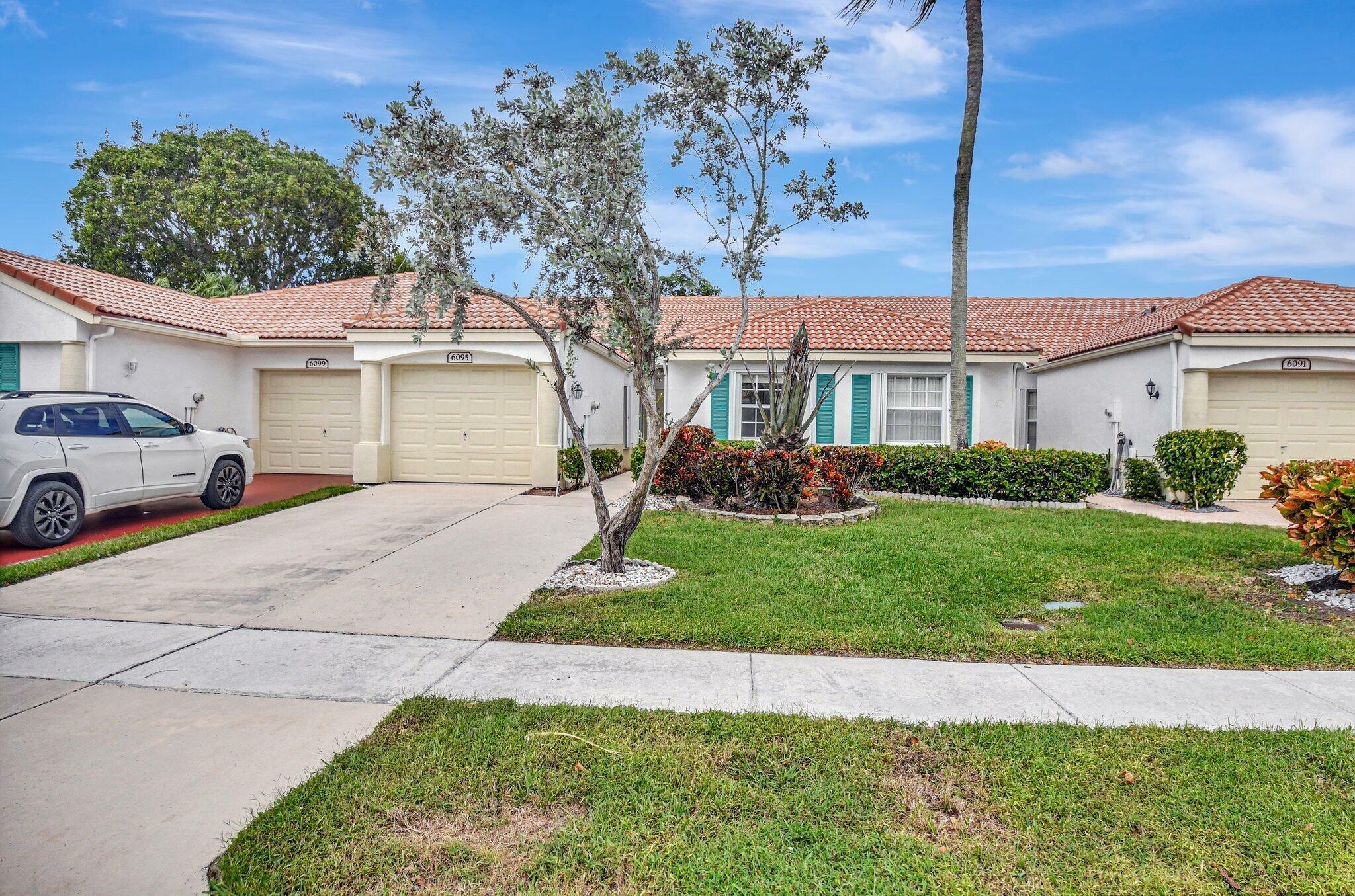 Property Photo: 6095 Floral Lakes Drive FL 33484