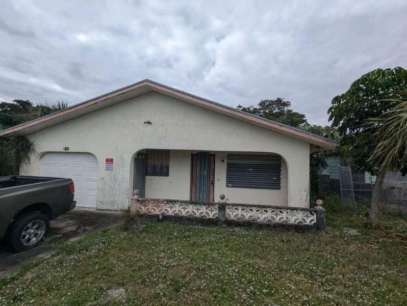 Property Photo:  24 NW 7th Avenue  FL 33444 