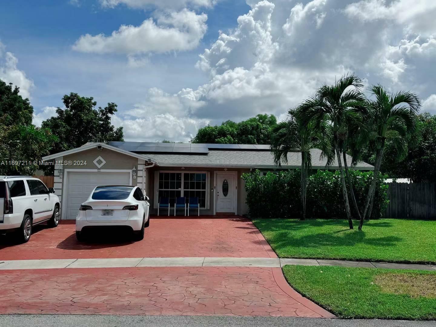 Property Photo:  301 NW 83rd Way  FL 33024 