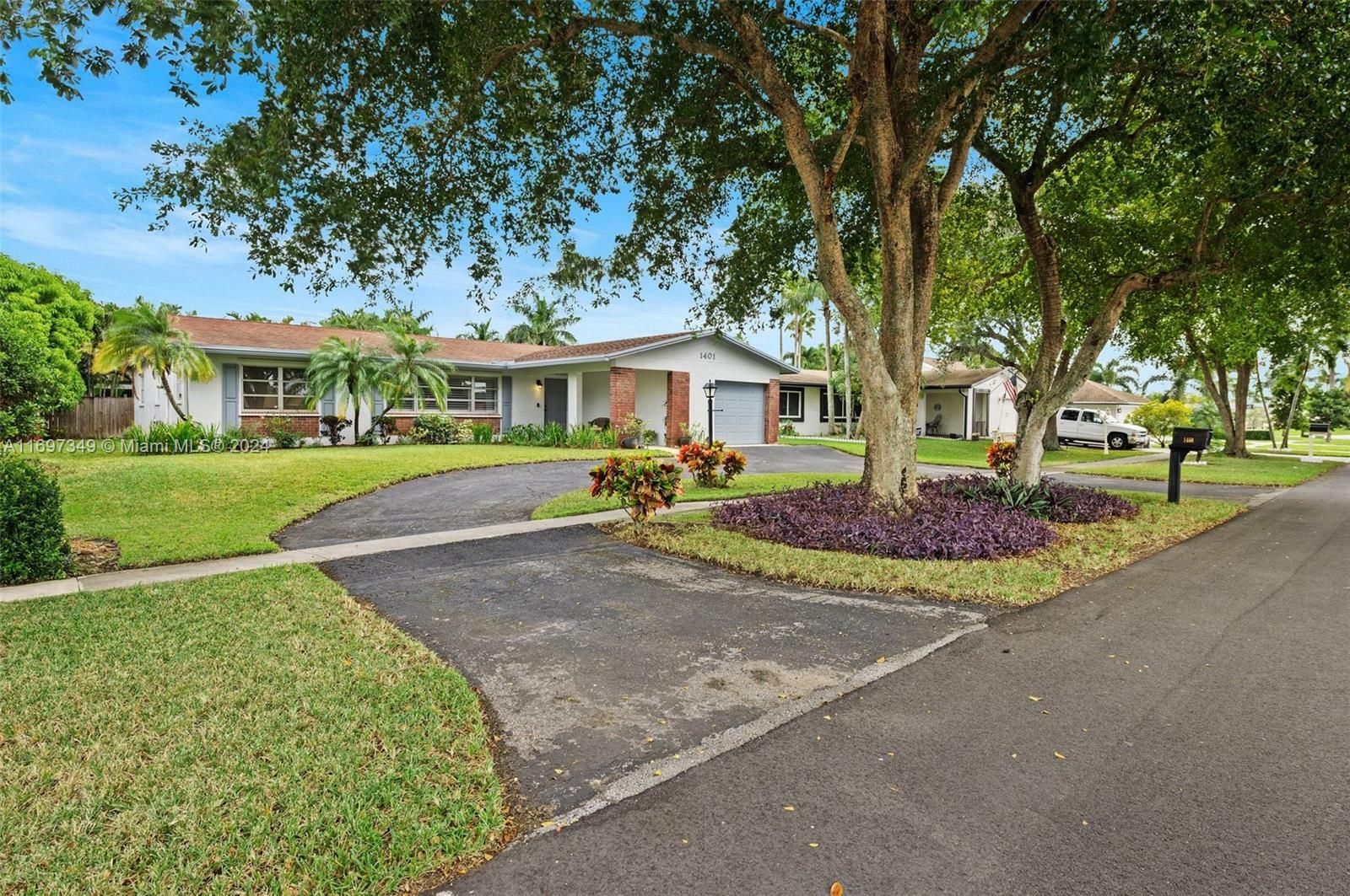 Property Photo:  1401 NW 122nd Ave  FL 33026 