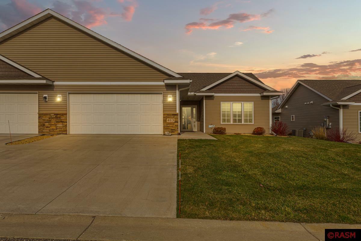 Property Photo:  413 E Skylark Trail  MN 56001 