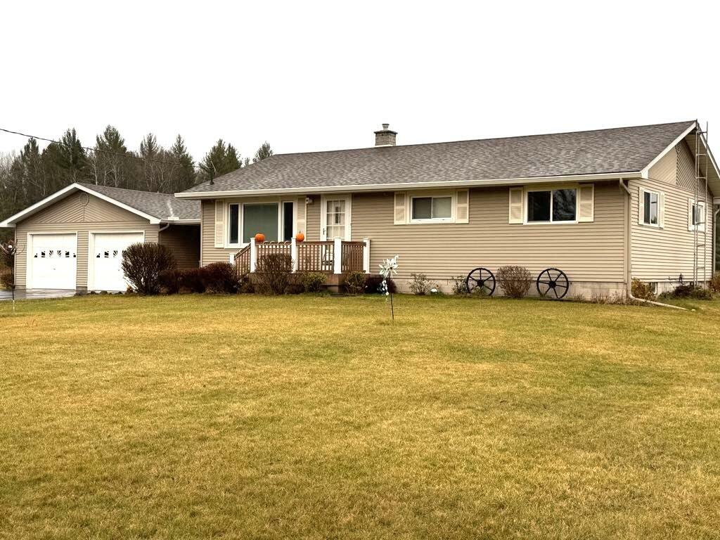 Property Photo: 10845 Long Rapids Road MI 49753
