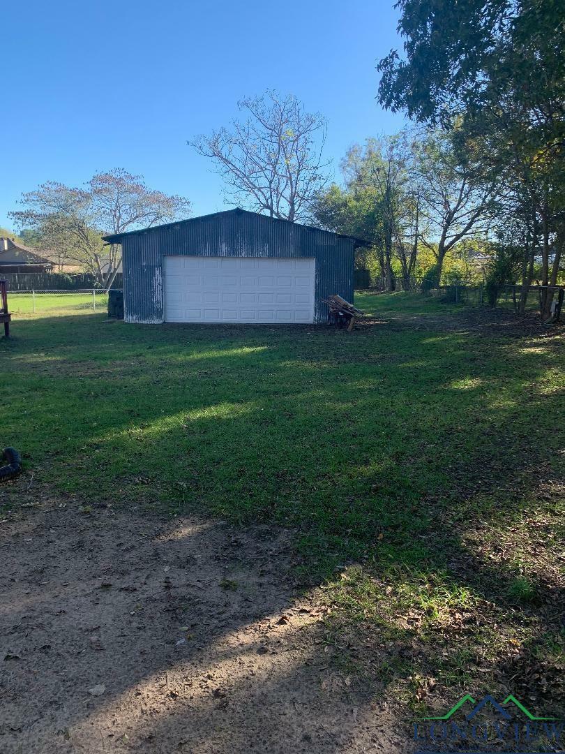 Property Photo:  110 E Cedar  TX 75650 