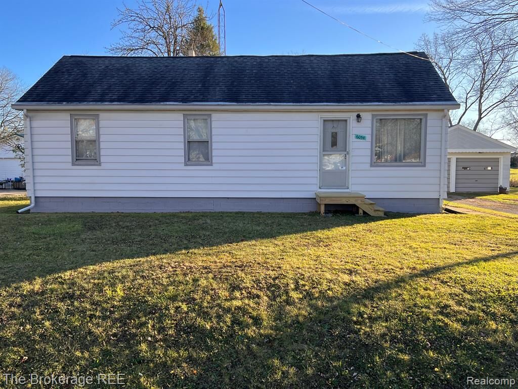 Property Photo:  6054 Bellingham  MI 48519 1614 