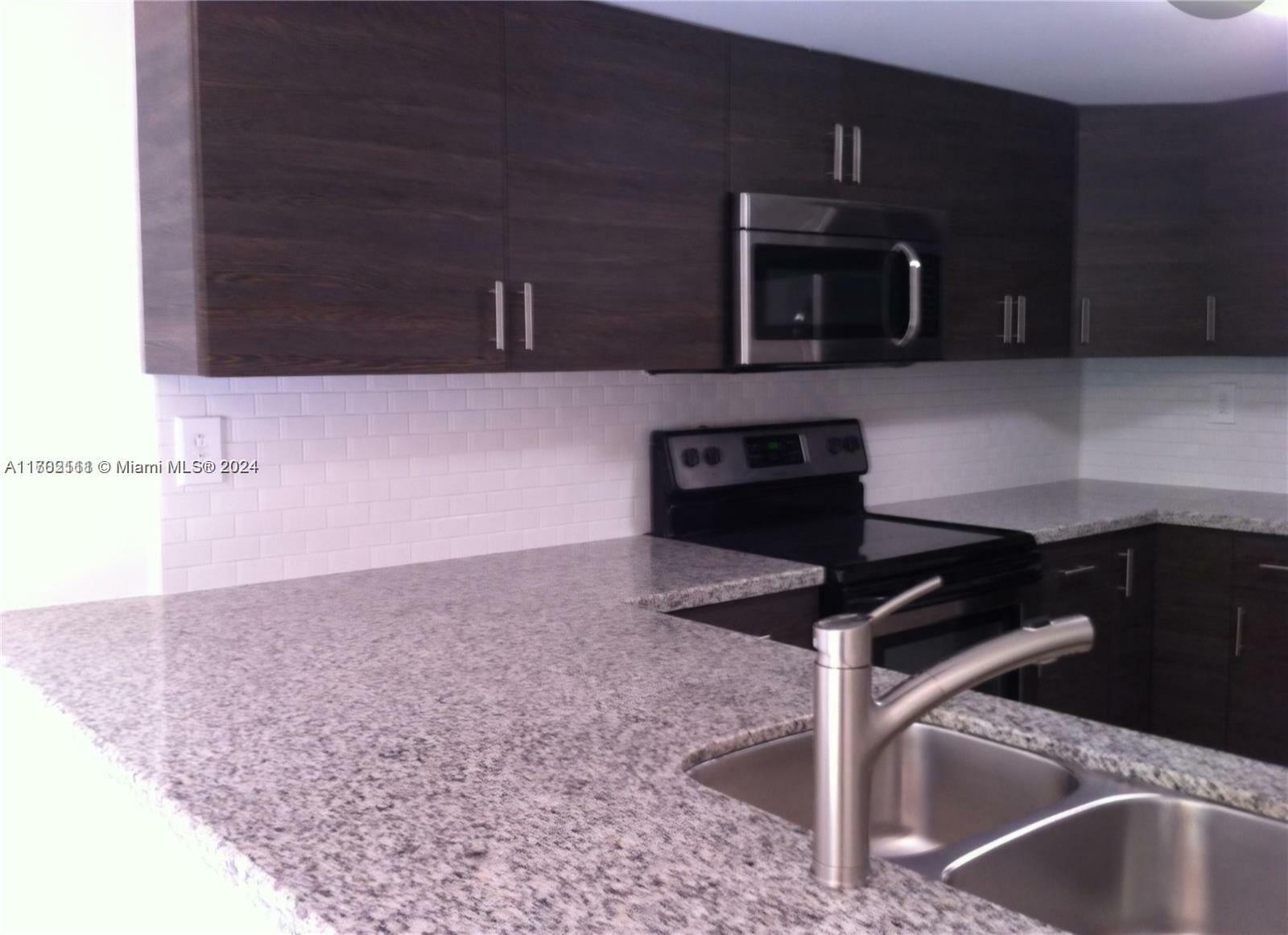 Property Photo:  9203 Fontainebleau Blvd 108  FL 33172 