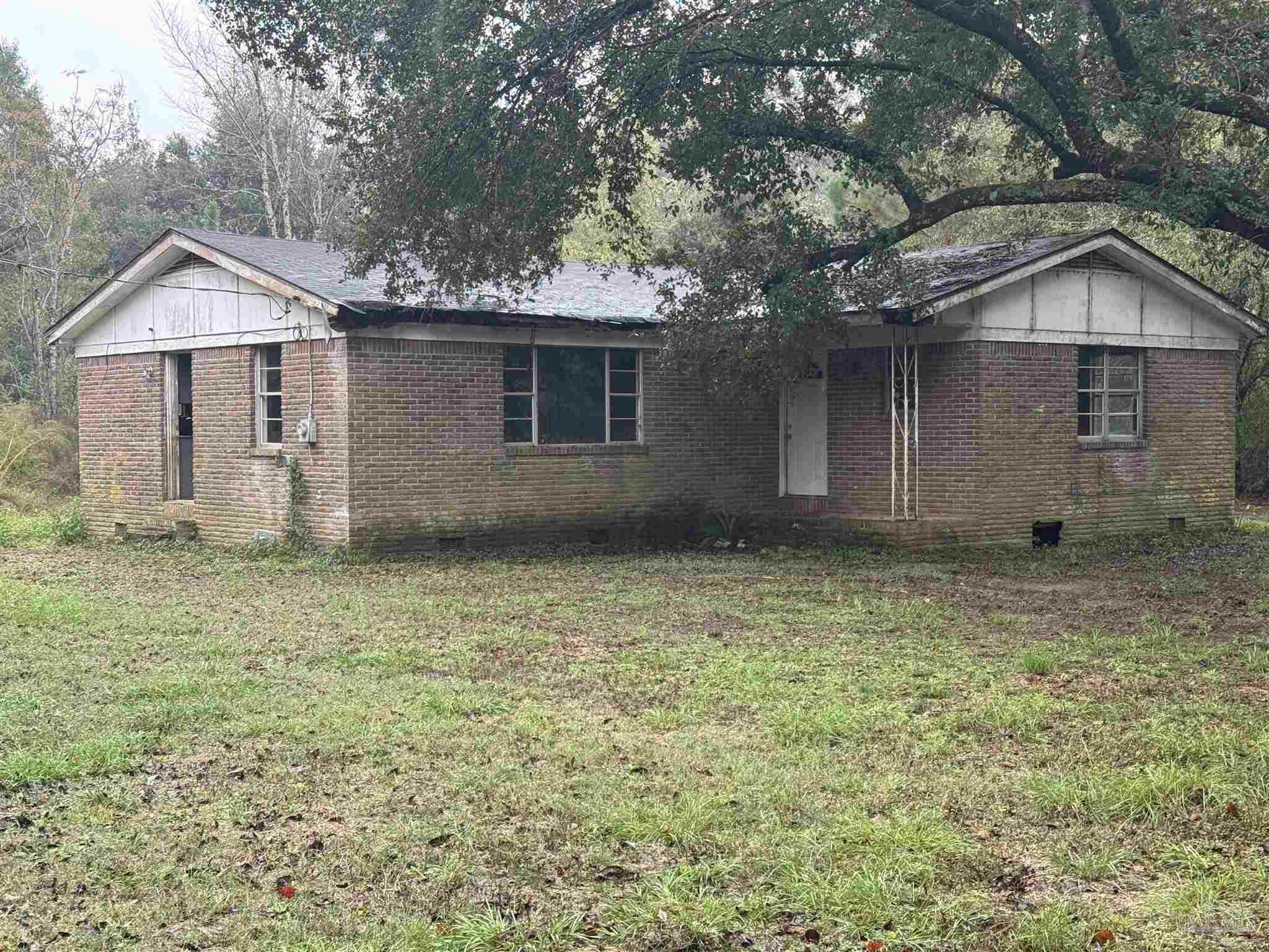 Property Photo:  9985 Paws Rd  FL 32570 