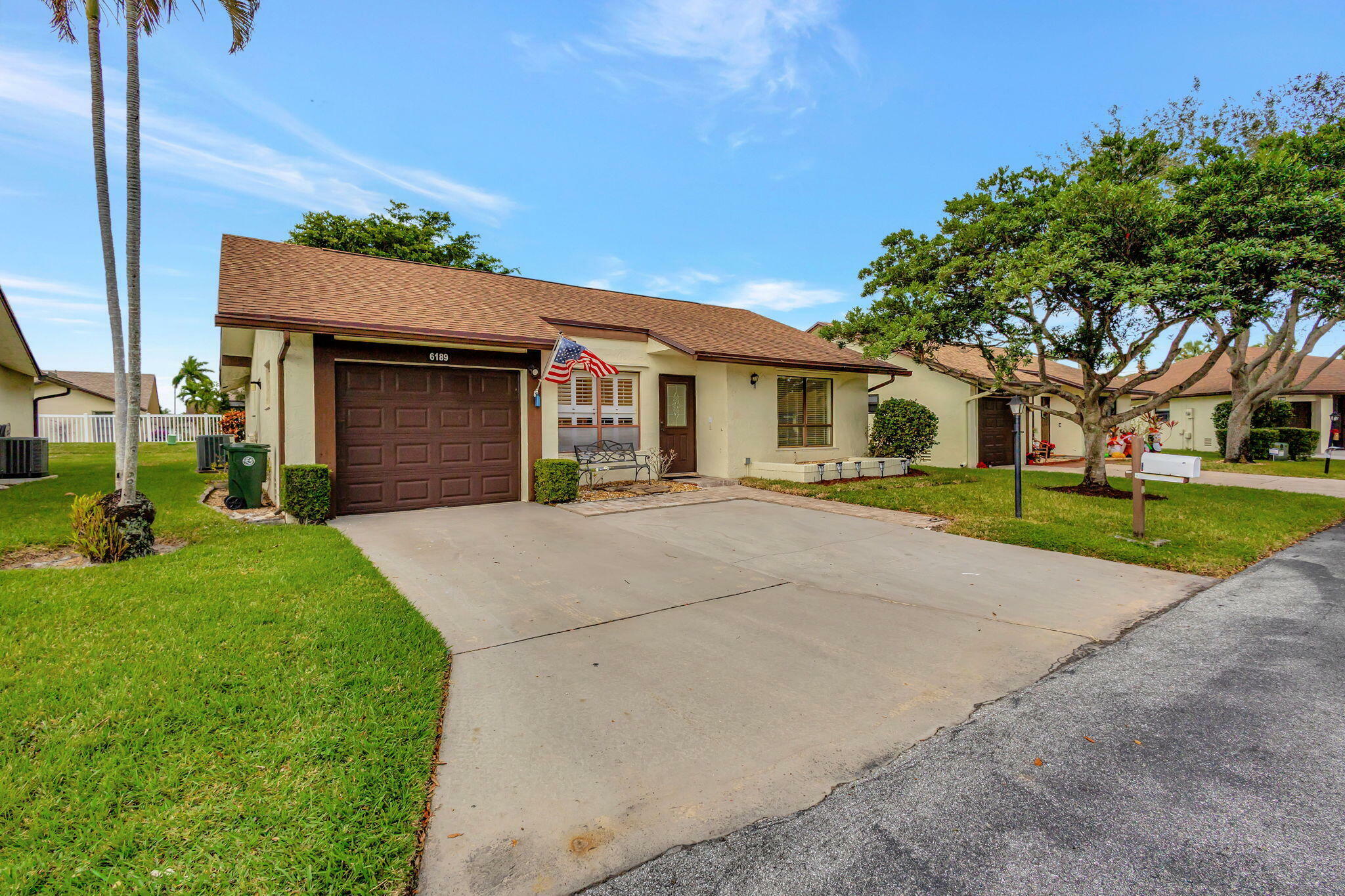 Property Photo:  6189 Olivewood Circle  FL 33463 