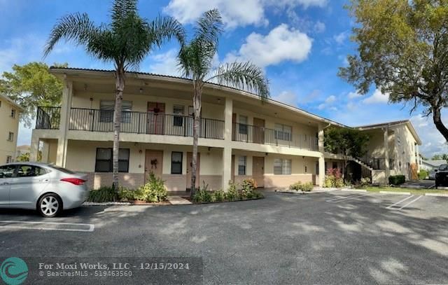 Property Photo:  8705 NW 38th Dr 4B  FL 33065 