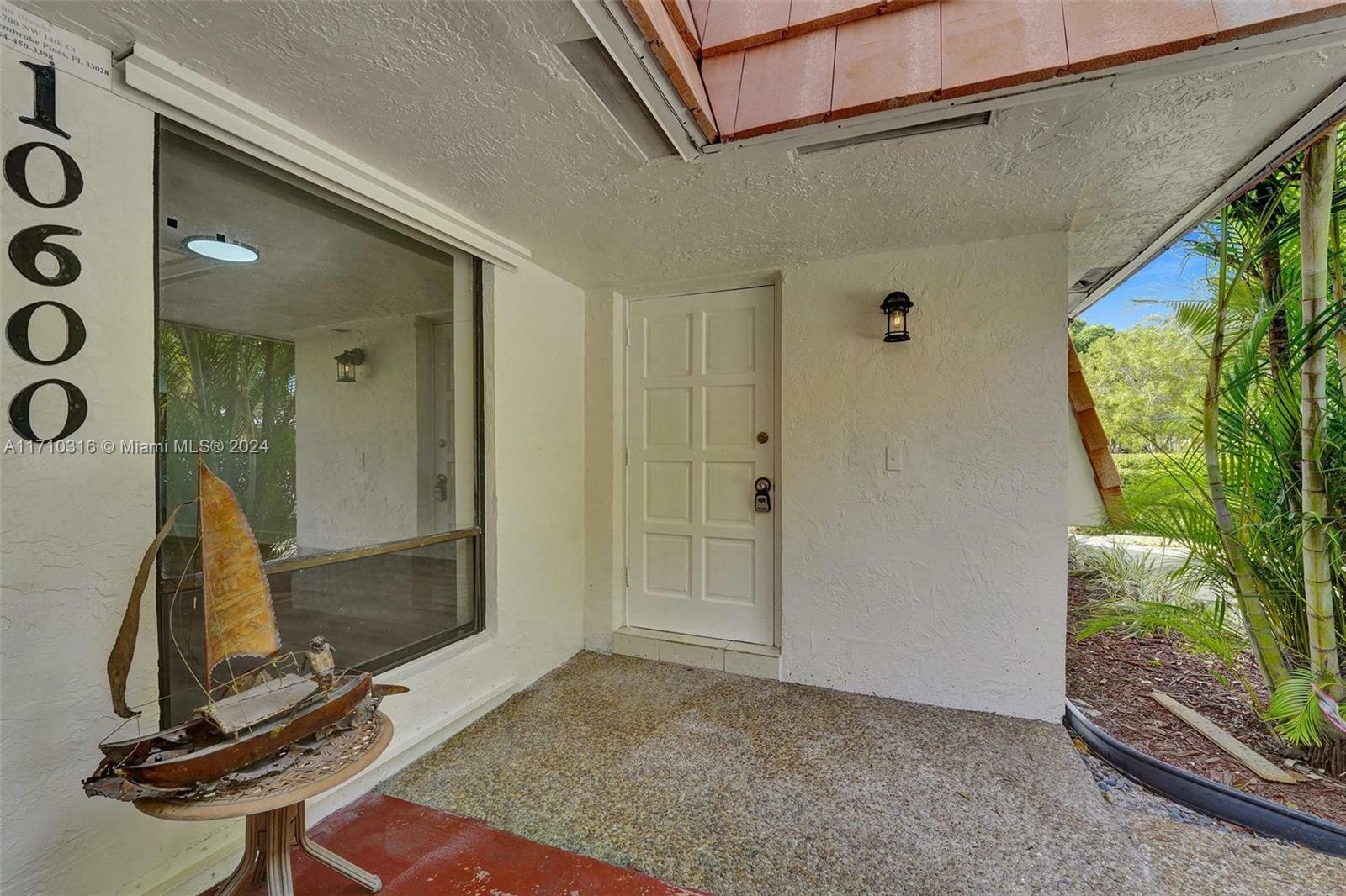 Property Photo:  10600 NW 45th St E-W  FL 33065 