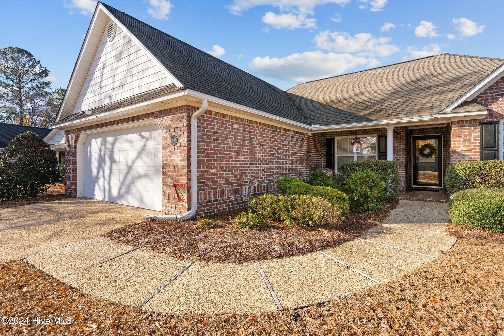 Property Photo:  1208 Willowgreen Court  NC 28479 