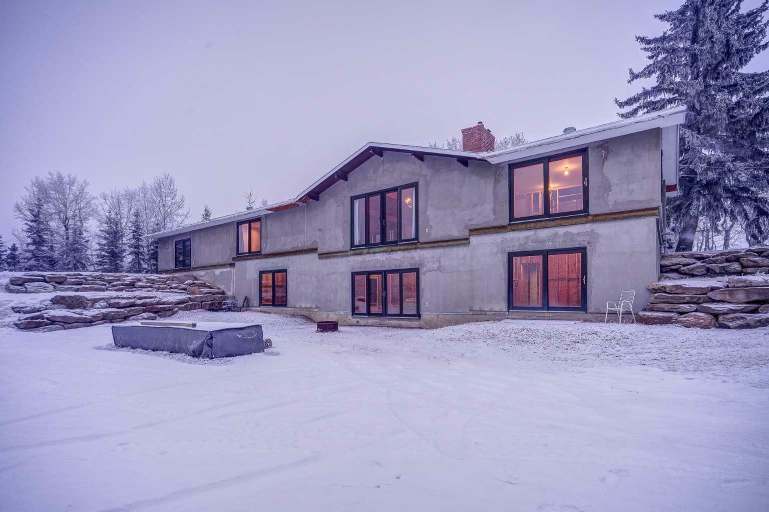 Property Photo:  255161 Bearspaw Road  AB T3R 1B5 