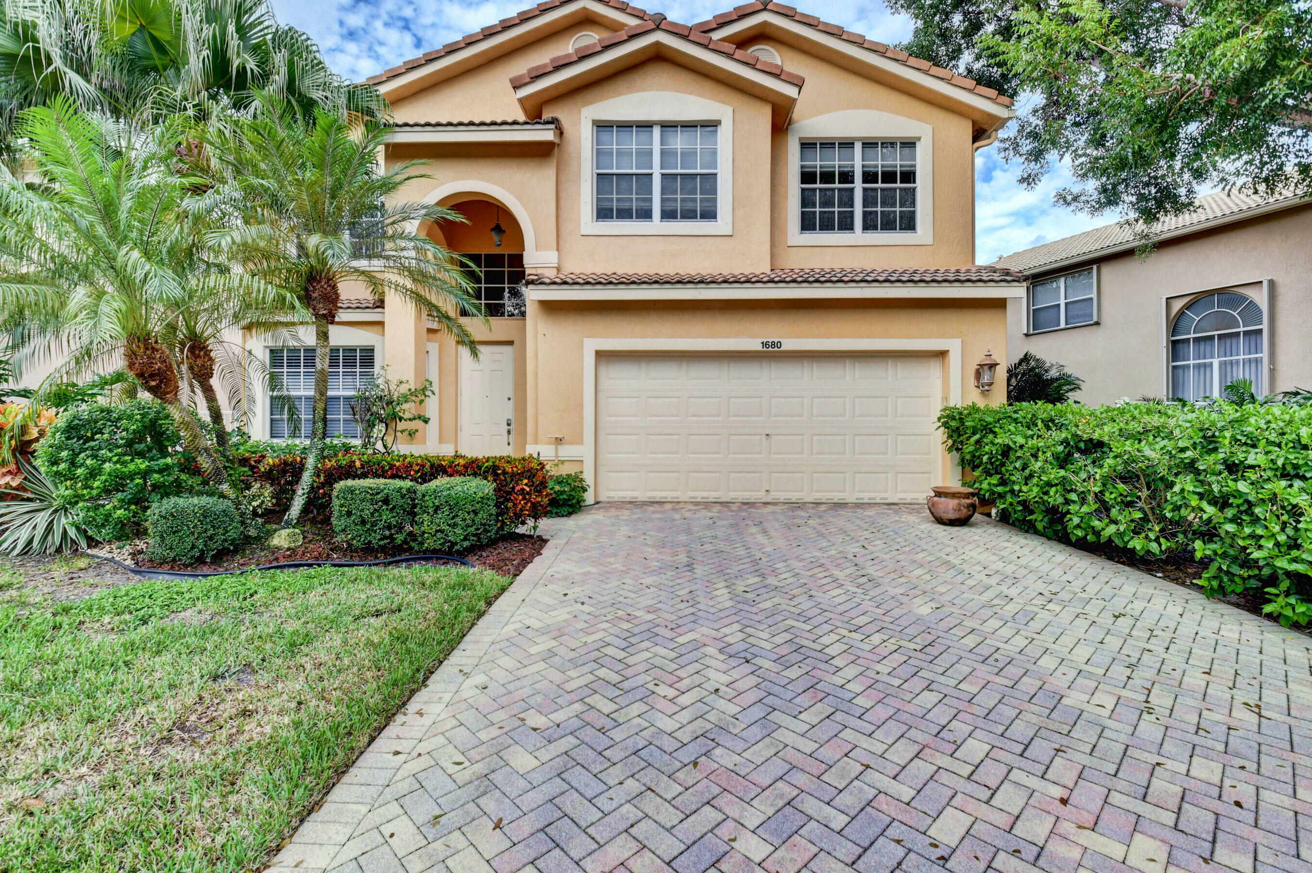 Property Photo:  1680 E Classical Boulevard  FL 33445 