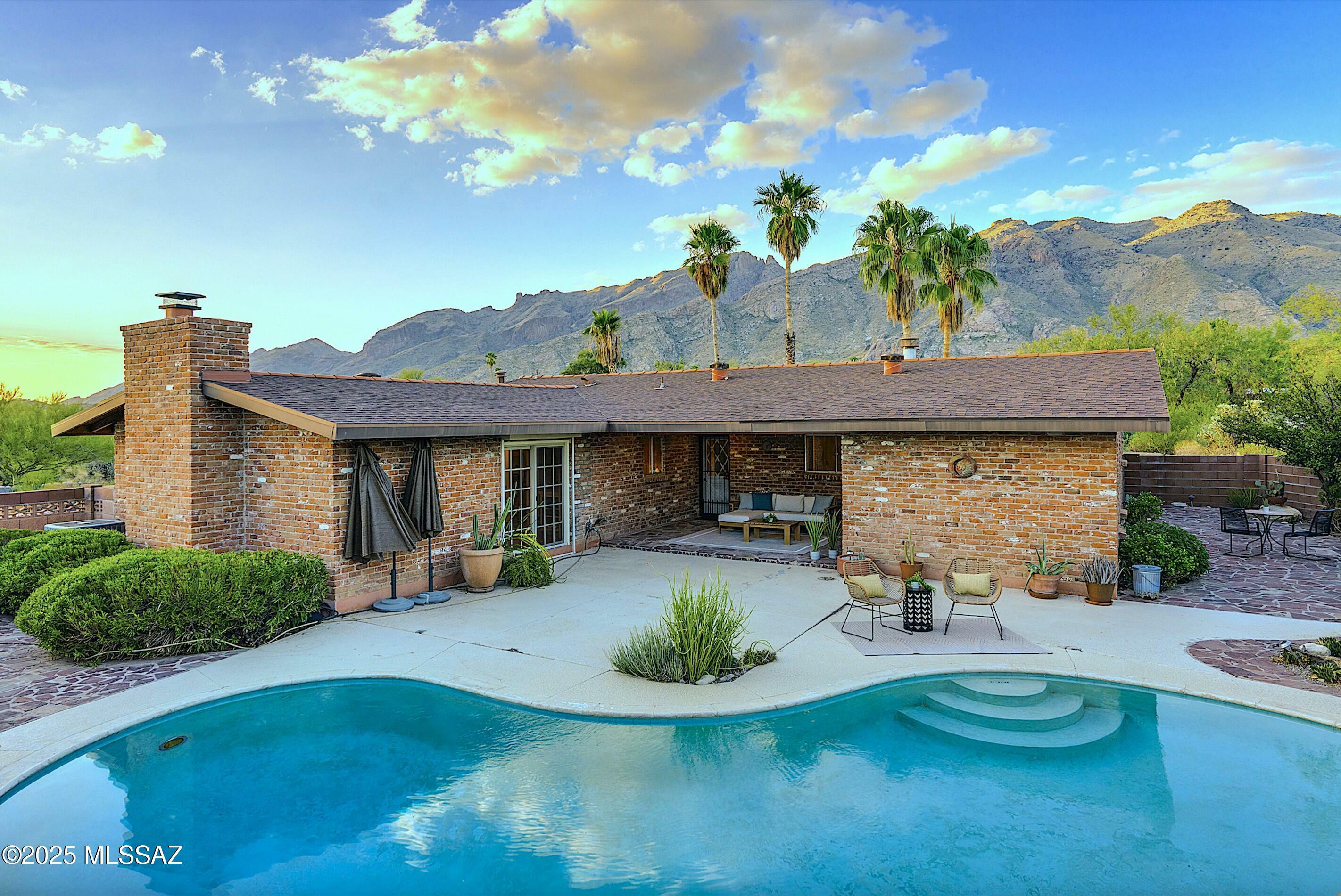 4860 E Camino De Los Olivos  Tucson AZ 85718 photo