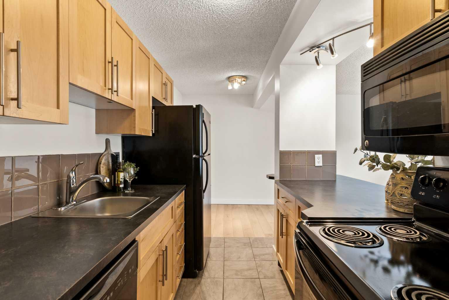 Property Photo:  620 15 Avenue SW 403  AB T2R 0R5 