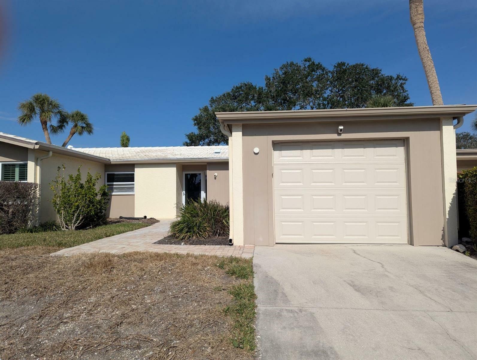 Property Photo:  111 Whispering Sands Circle V38  FL 34242 