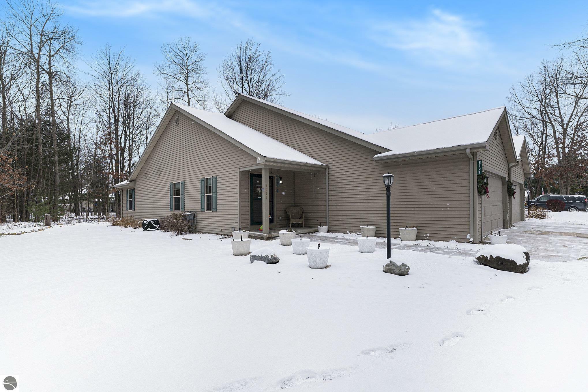 Property Photo:  3121 Aspen Bluff  MI 49686 