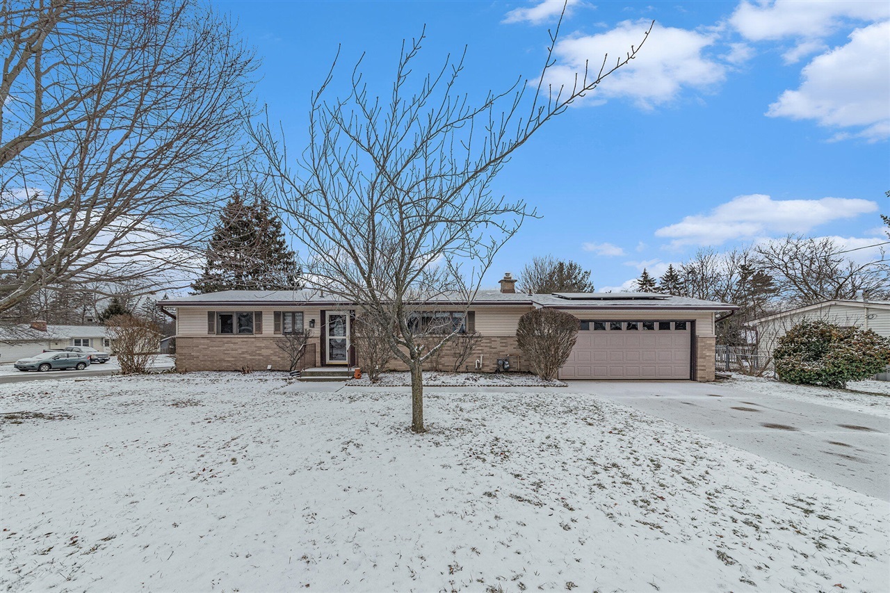 Property Photo:  4114 Sawkaw Drive  MI 49525-1858 