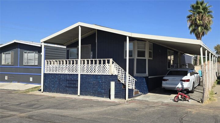 Property Photo: 21845 Grand Terrace Road 55 CA 92313