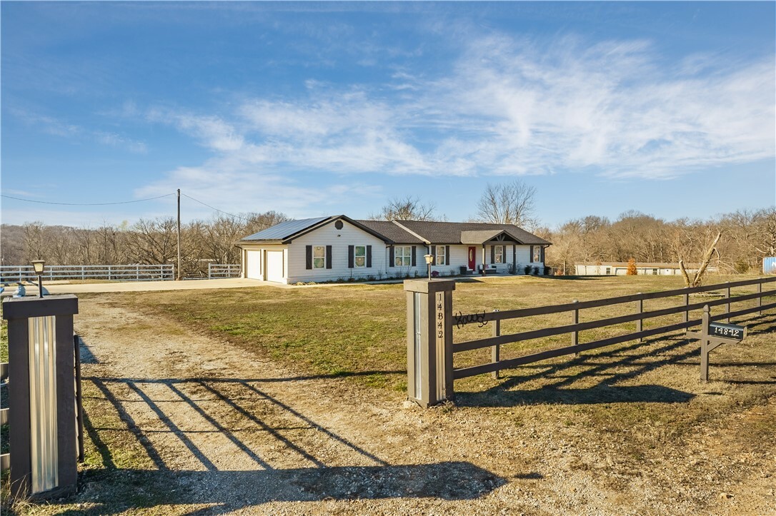 Property Photo:  14842 Mariano Road  AR 72712 