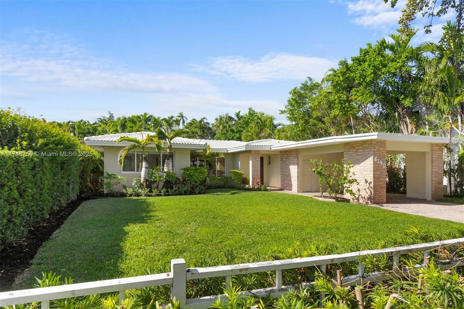 Property Photo:  6140 Pine Tree Drive  FL 33140 