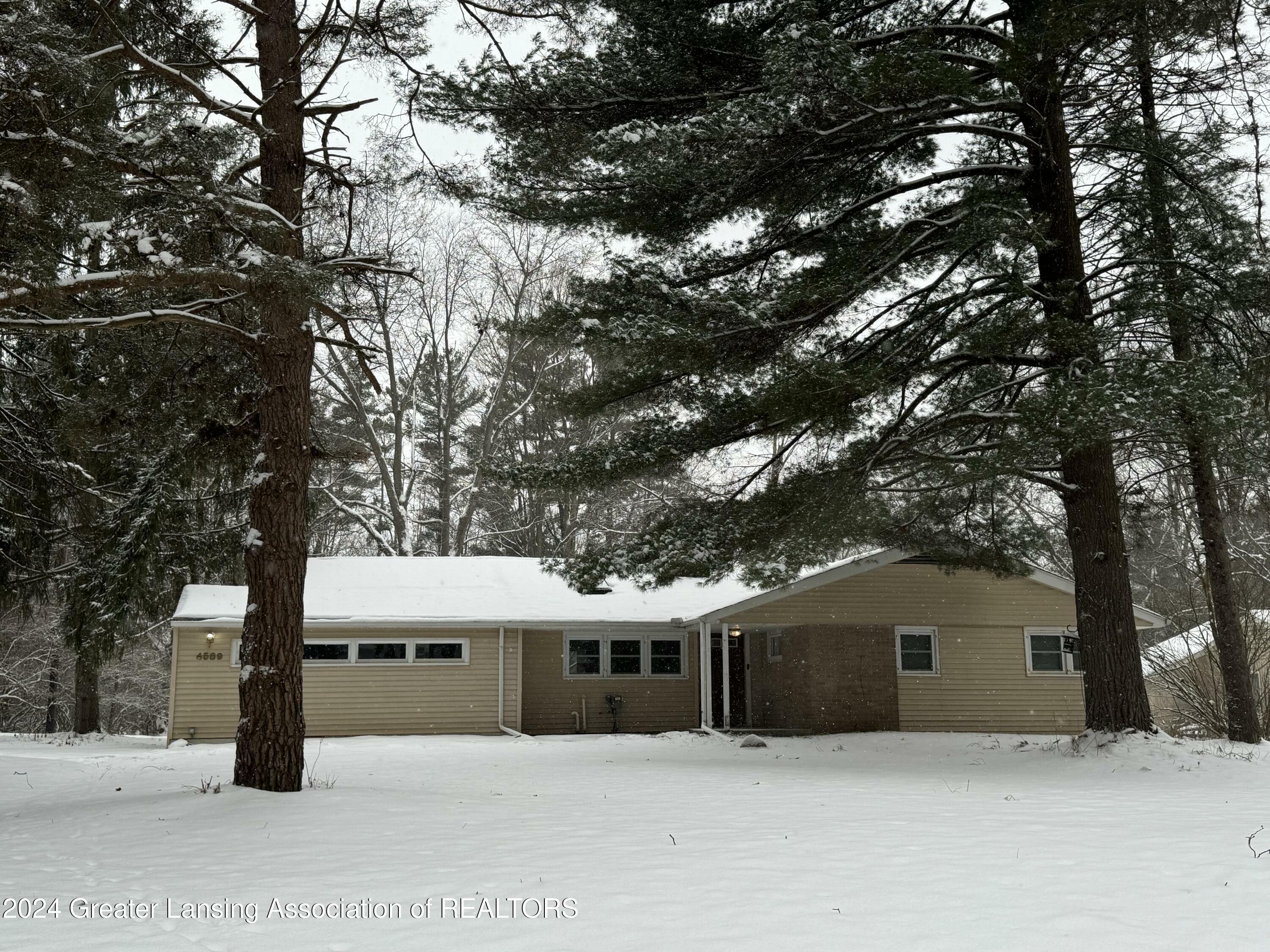 Property Photo:  4589 Van Atta Road  MI 48864 