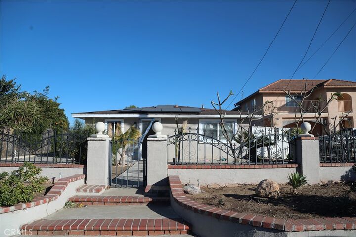 Property Photo:  9815 Locust Avenue  CA 92316 
