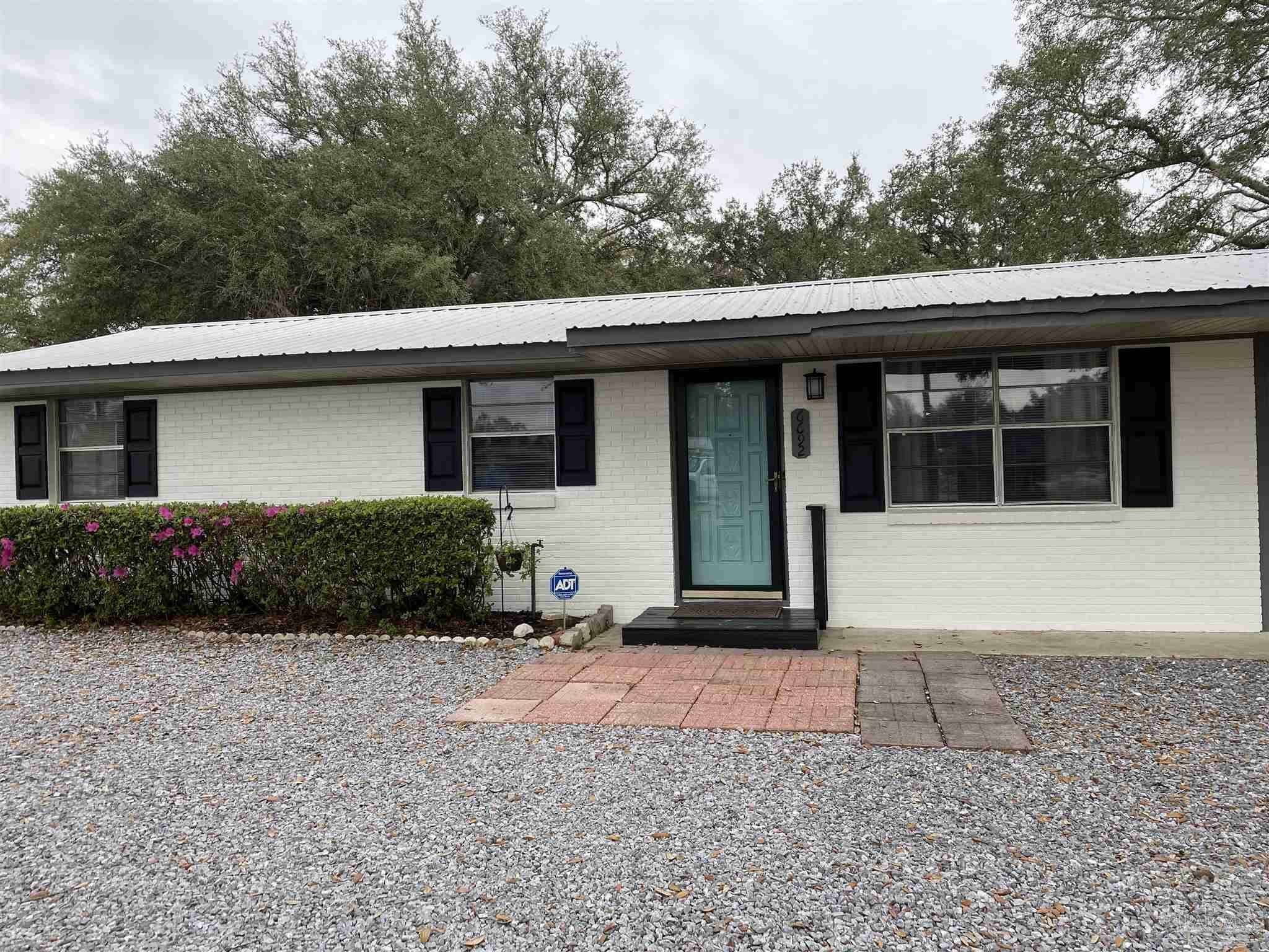 Property Photo:  6692 E Magnolia St  FL 32570 