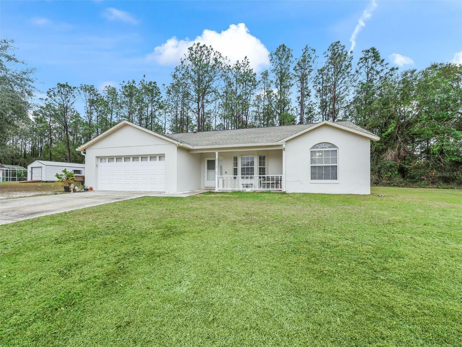 Property Photo:  39727 Redbud Road  FL 32159 