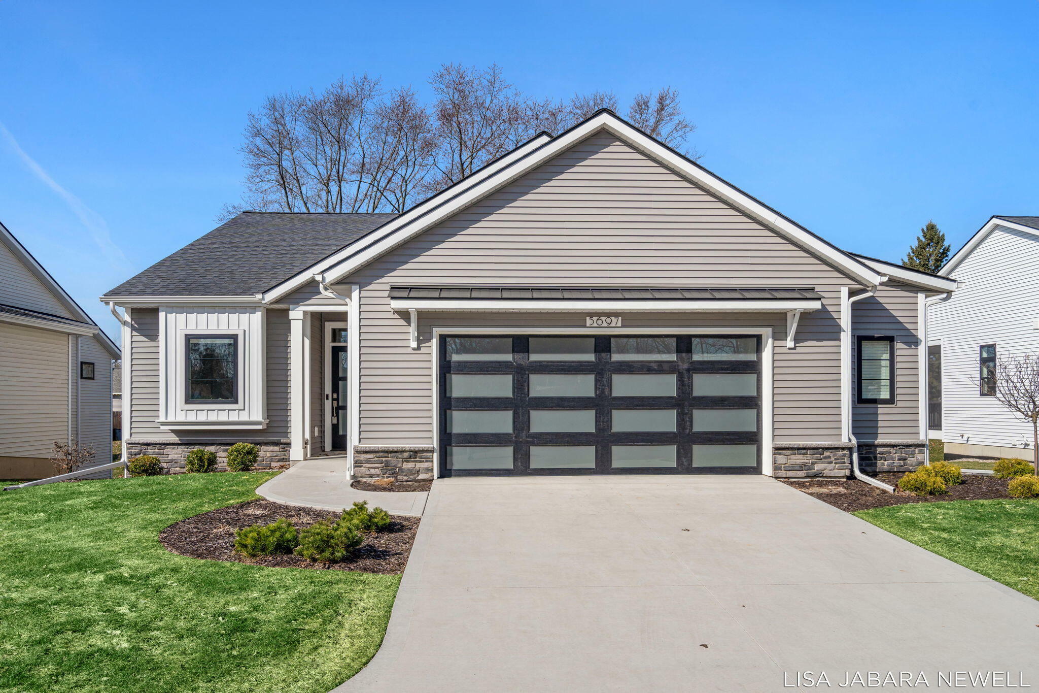 Property Photo: 5697 Vandebunte Court MI 49426