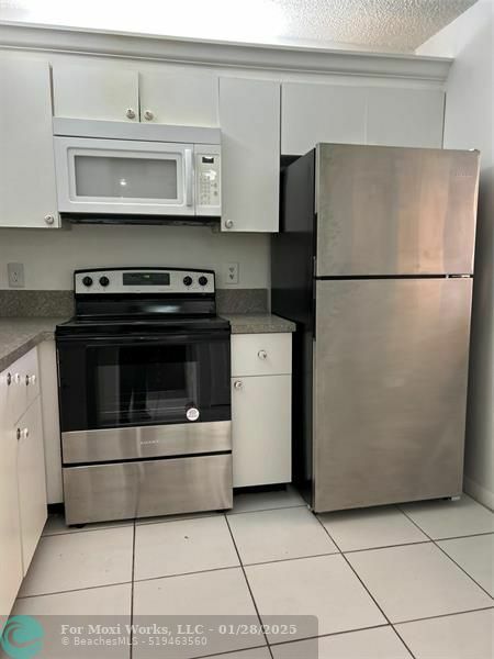 Property Photo:  9273 SW 8th St 320  FL 33428 