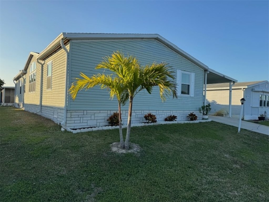 Property Photo:  7660 Kyak Court Q19  FL 32976 
