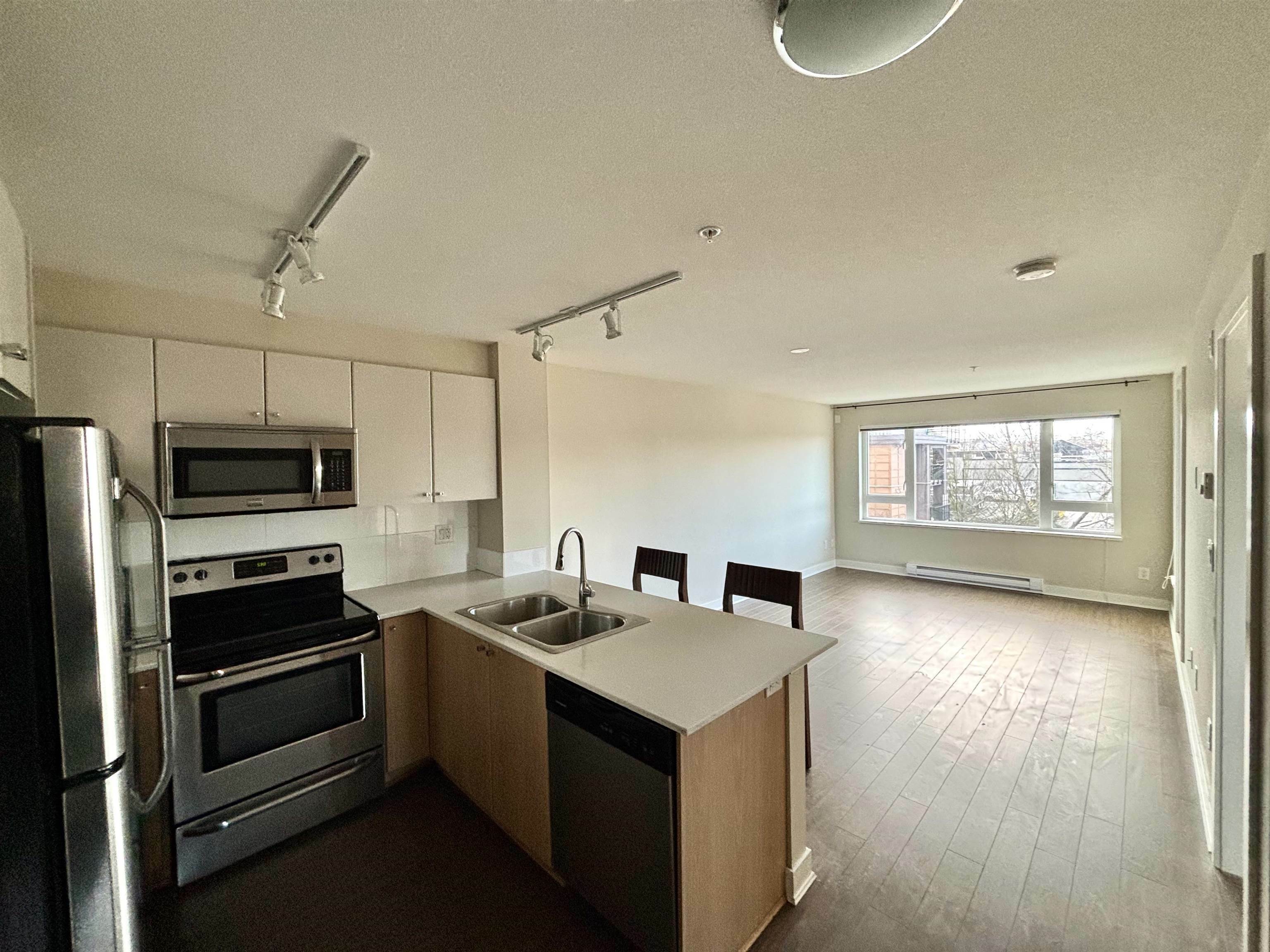 Property Photo:  13740 75A Avenue 304  BC V3W 0E8 