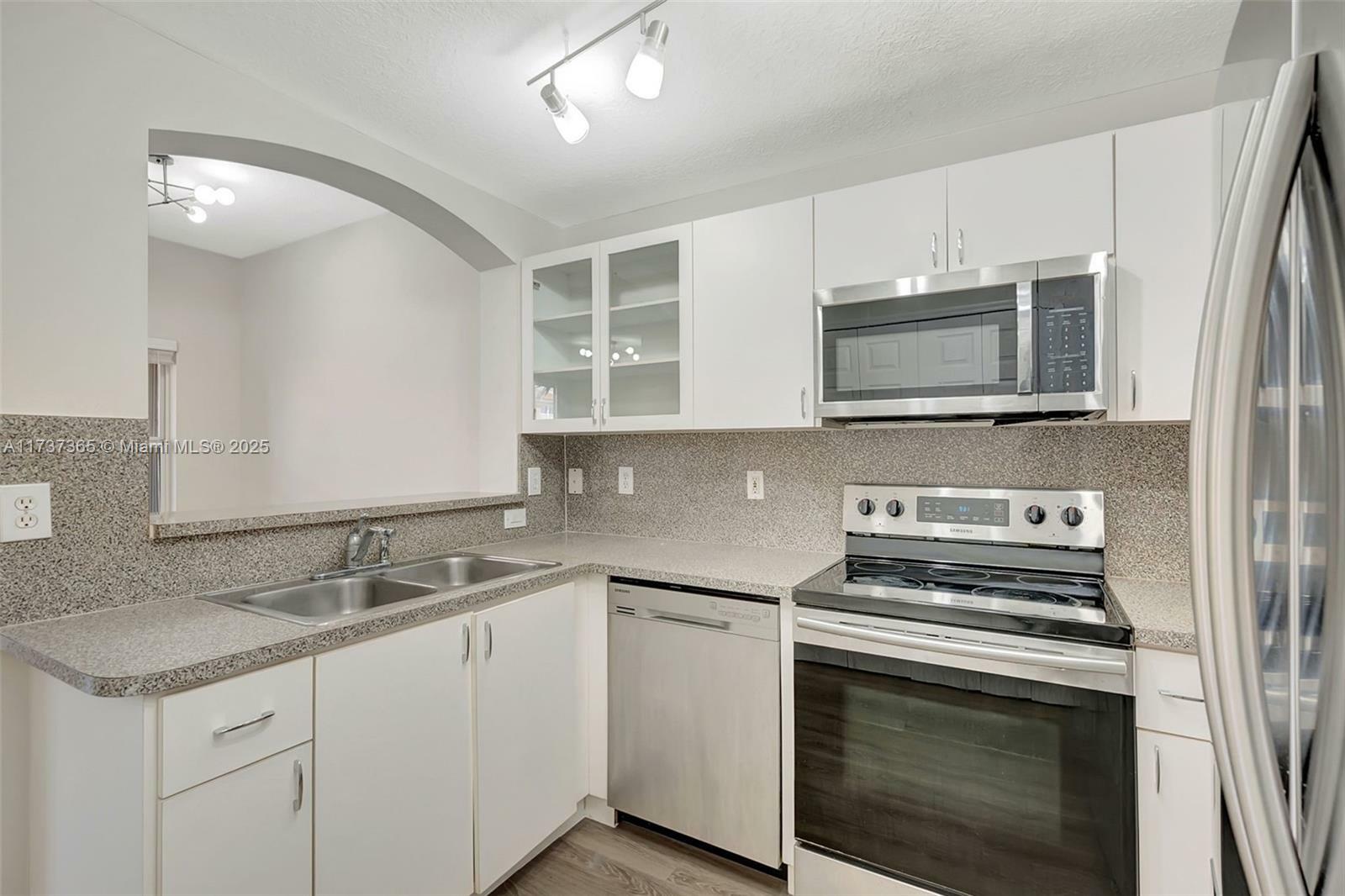 Property Photo:  6141 NW 115th Pl 352  FL 33178 