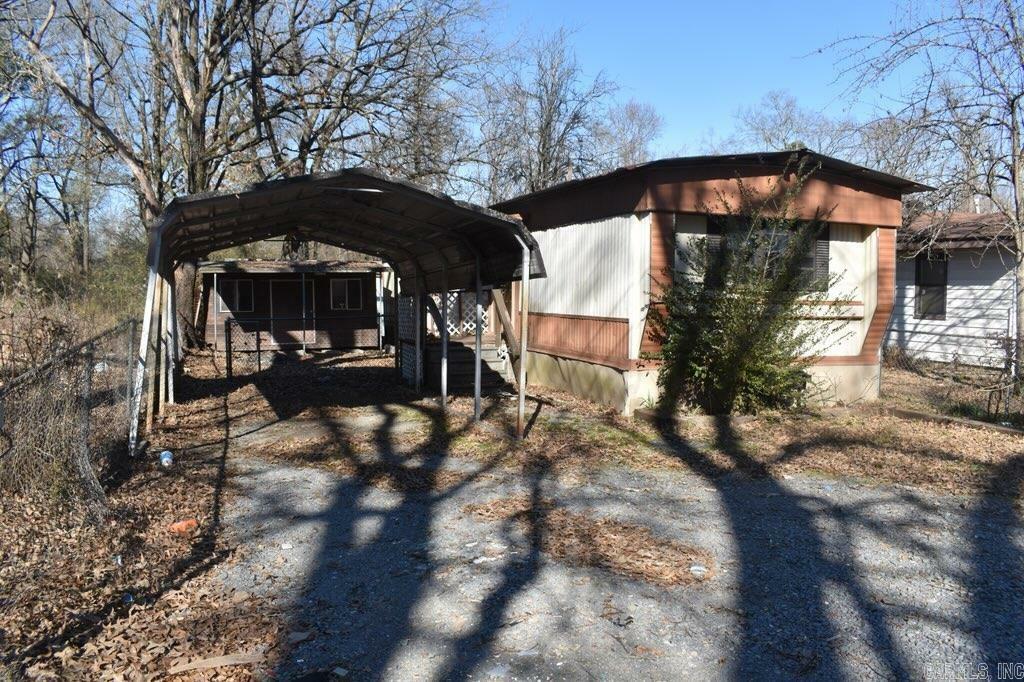 Property Photo:  5801,05,07 Womack  AR 71601 