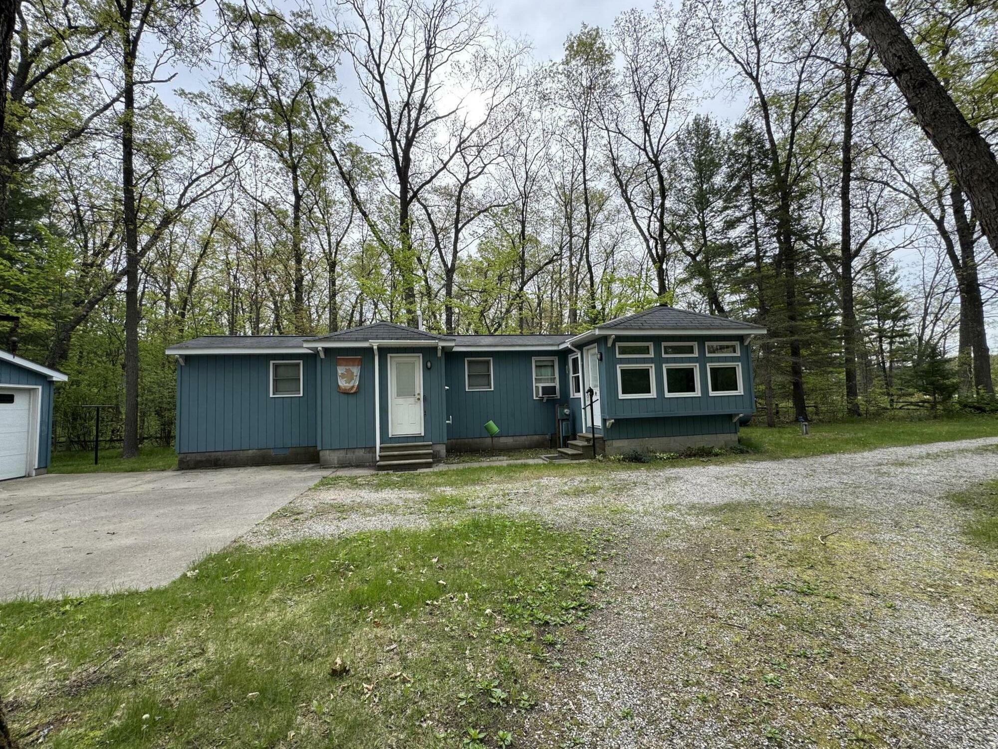 Property Photo:  18570 Caberfae Highway  MI 49689 