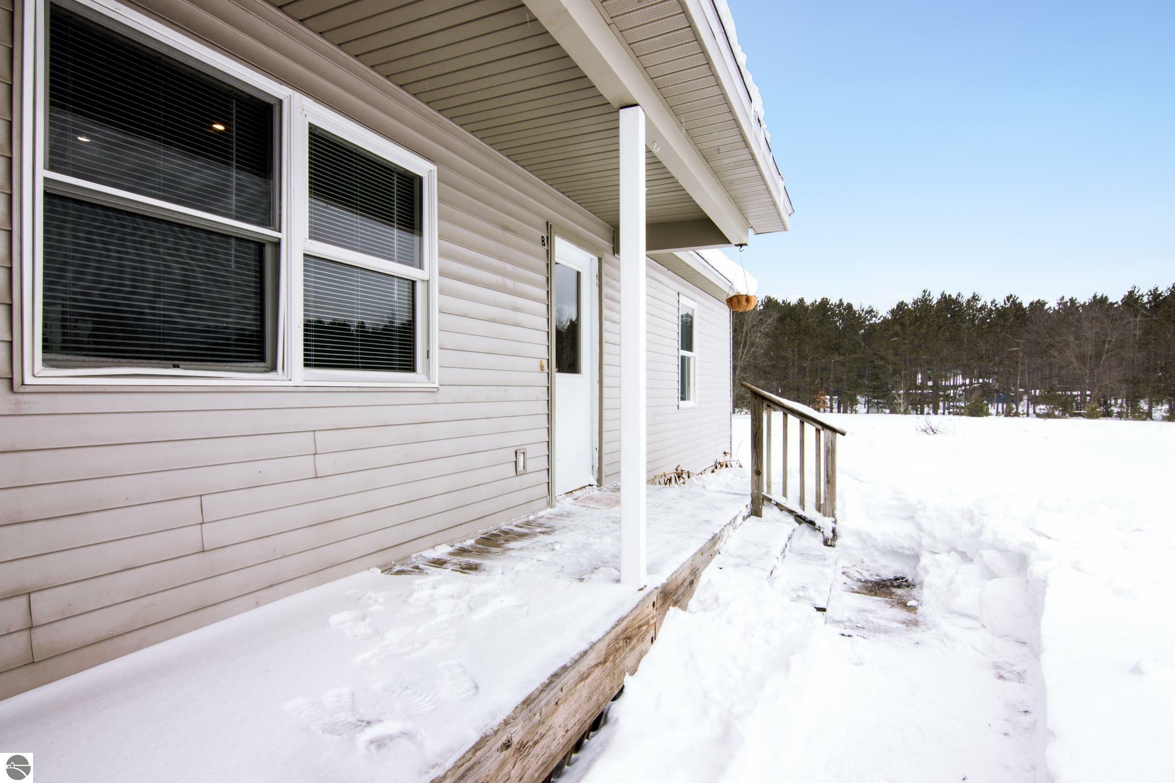 Property Photo:  7310 Tiger Drive  MI 49650 