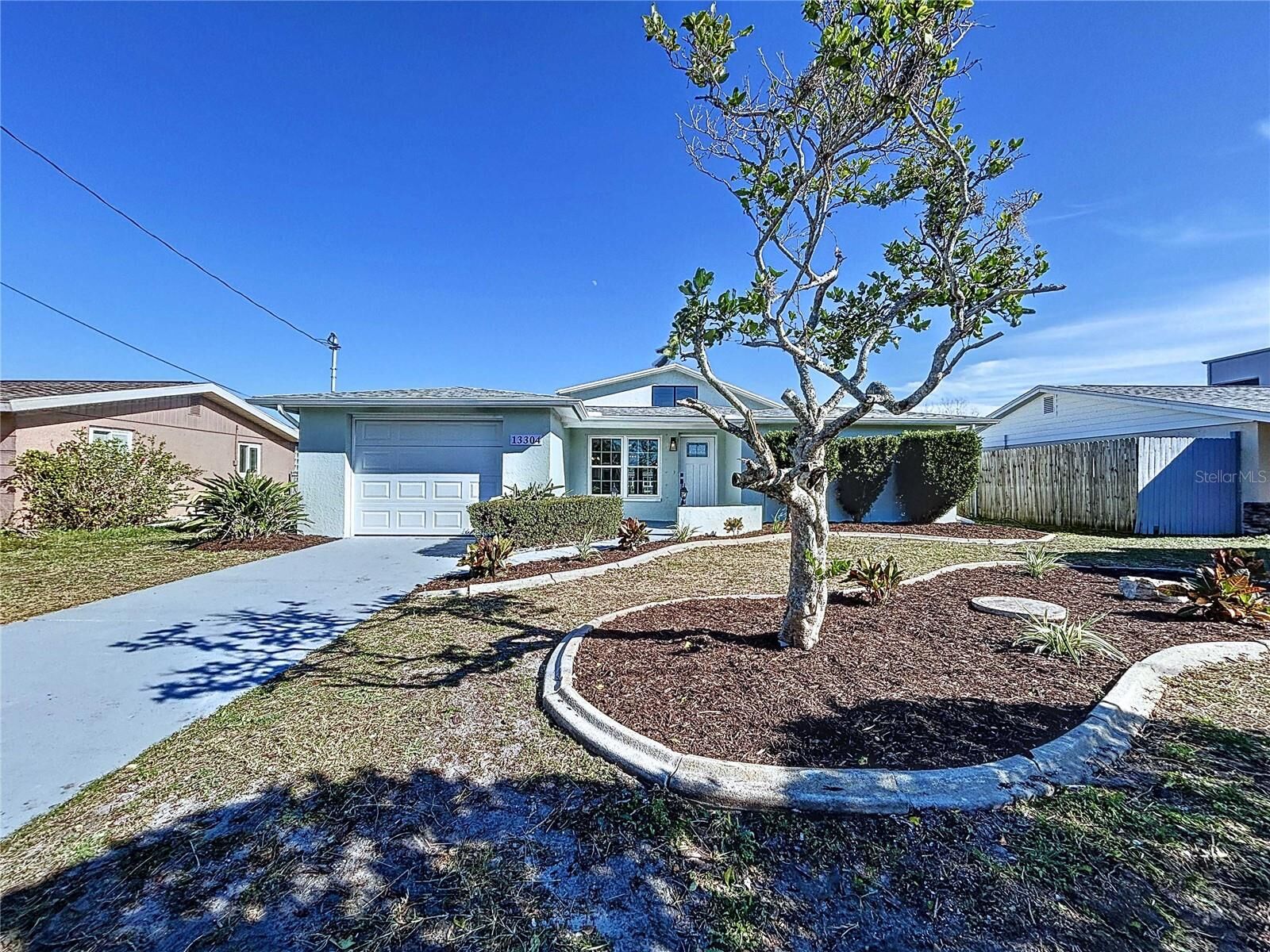 Property Photo: 13304 Neptune Drive FL 34667