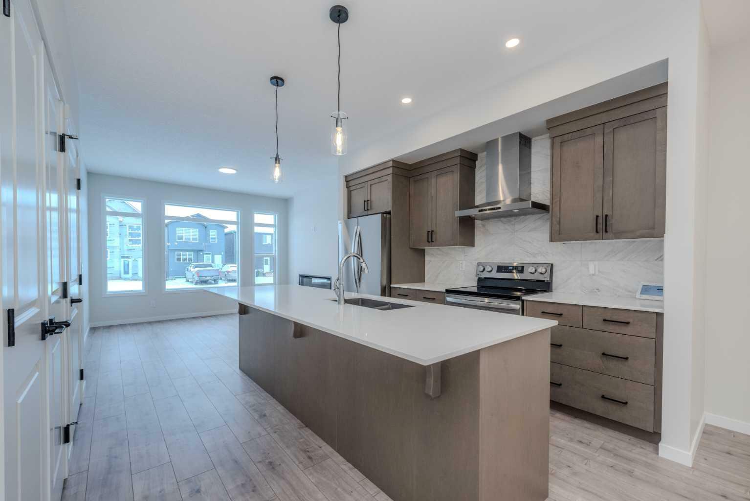 Property Photo:  112 Creekside Street SW  AB T2X 5S3 