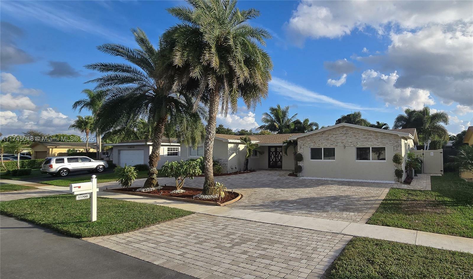 Property Photo:  11700 NW 15th Ct  FL 33026 