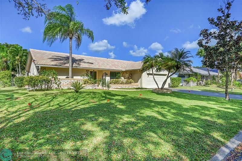 Property Photo:  11001 NW 13th Ct  FL 33071 