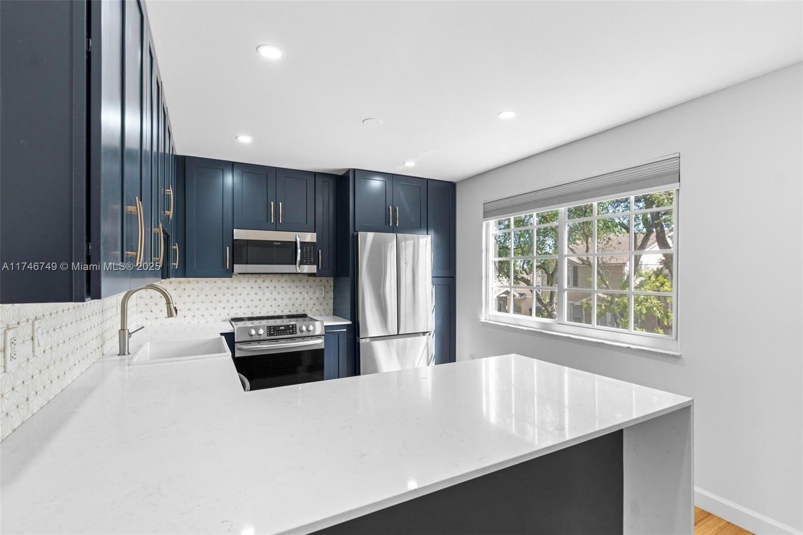 Property Photo: 14451 SW 122nd Pl 1102 FL 33186