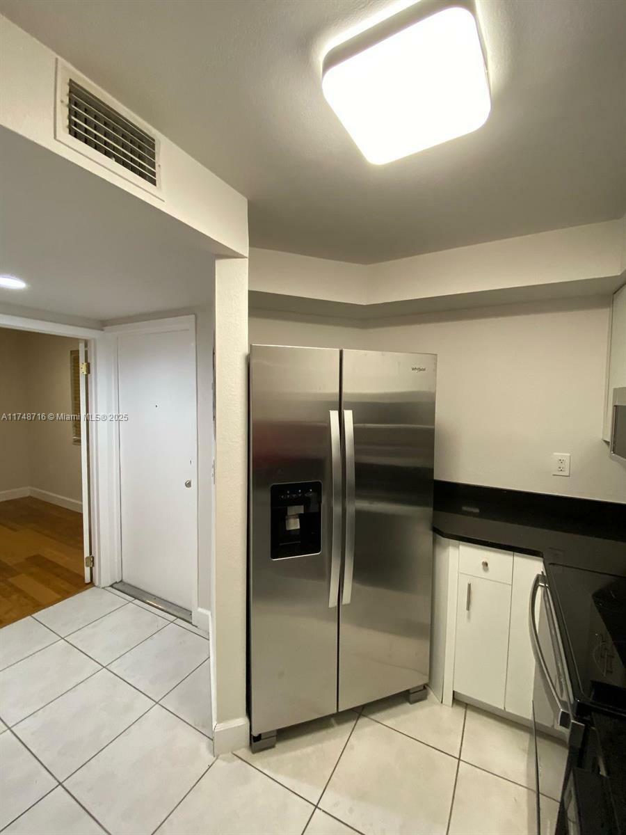 Property Photo:  8275 SW 152nd Ave D-102  FL 33193 