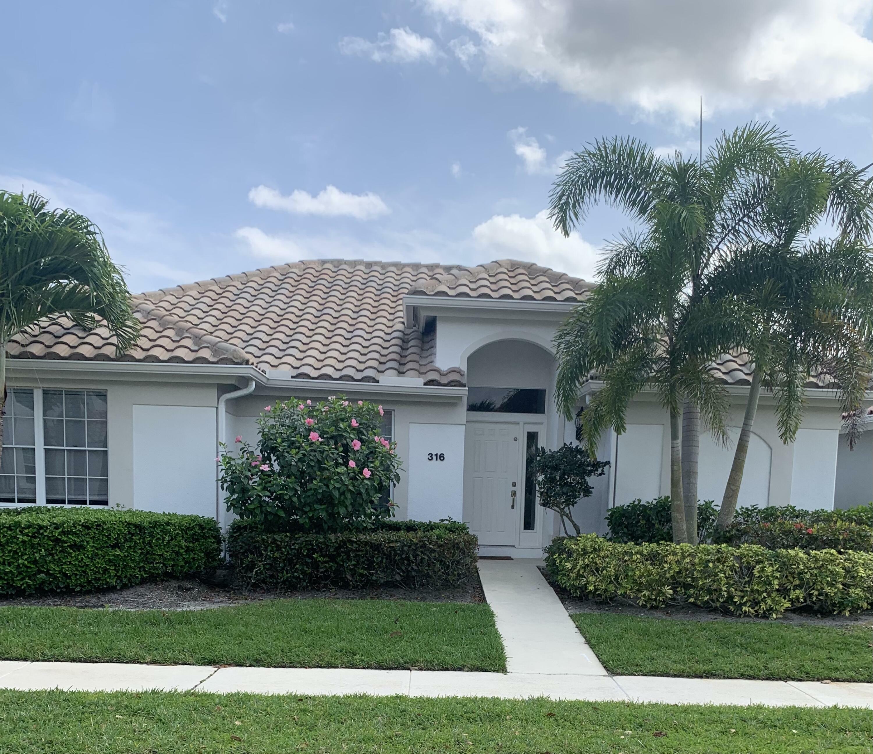 Property Photo:  316 Eagleton Golf Drive  FL 33418 