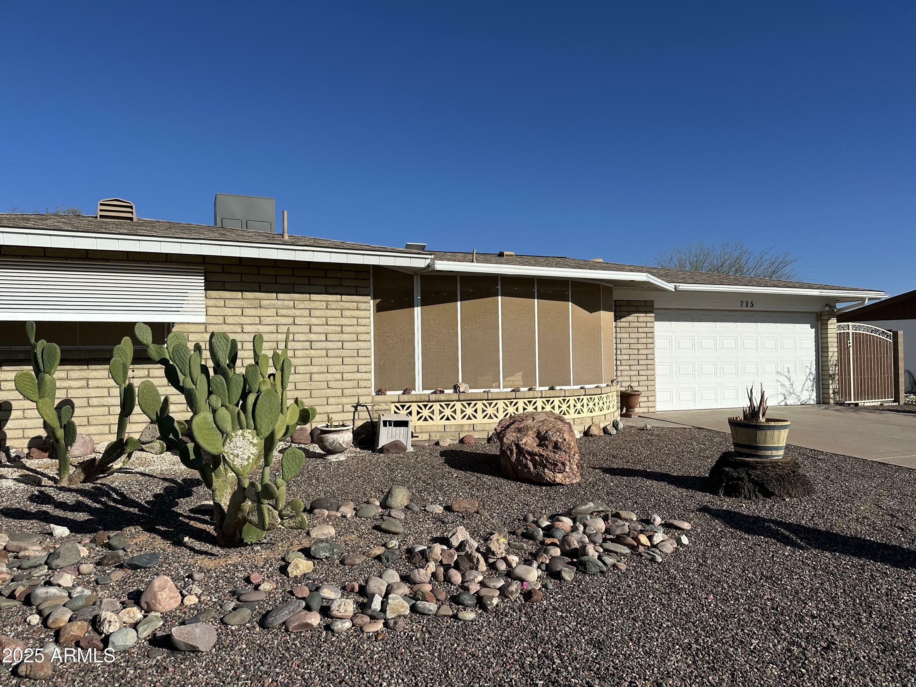 Property Photo:  715 N 65th Place  AZ 85205 