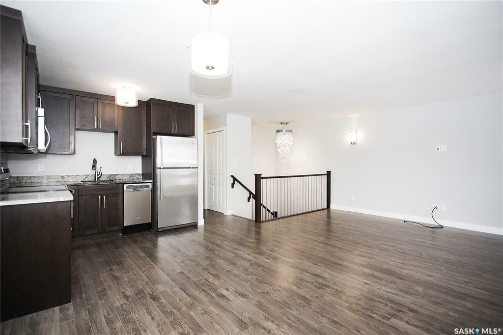 Property Photo:  2703 Spadina Crescent E 401  SK S7K 6P8 