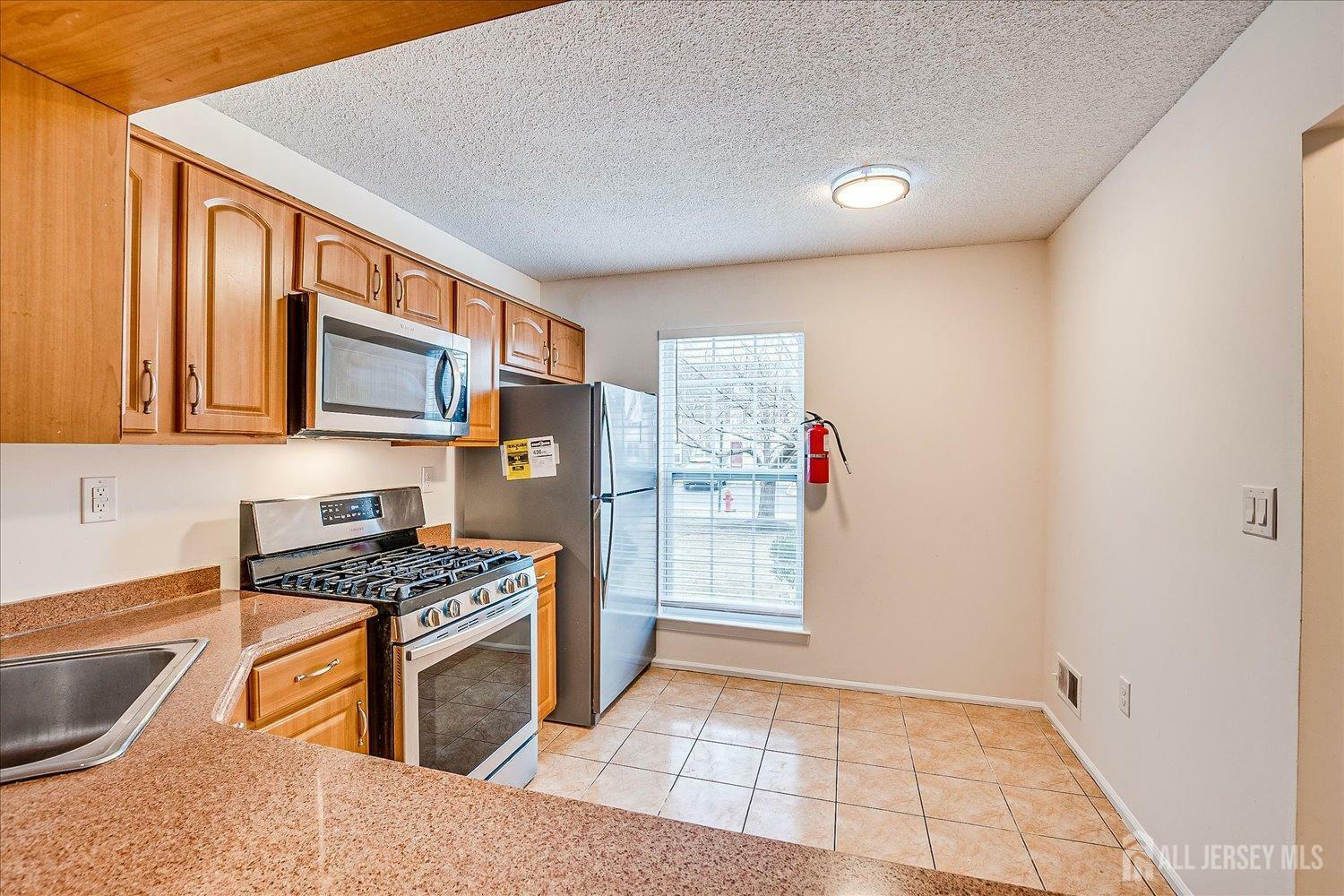 Property Photo: 22 Dartmouth Way NJ 08902