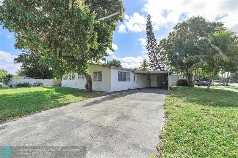 Property Photo:  5710 NE 2nd Ter  FL 33334 